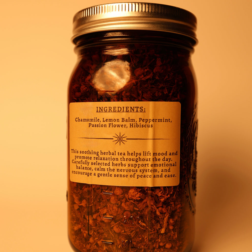 Deep Calm tea jar ingredients label - chamomile, lemon balm, peppermint, passion flower. A tea sold by MadMuchLove Holistic Healing. 
