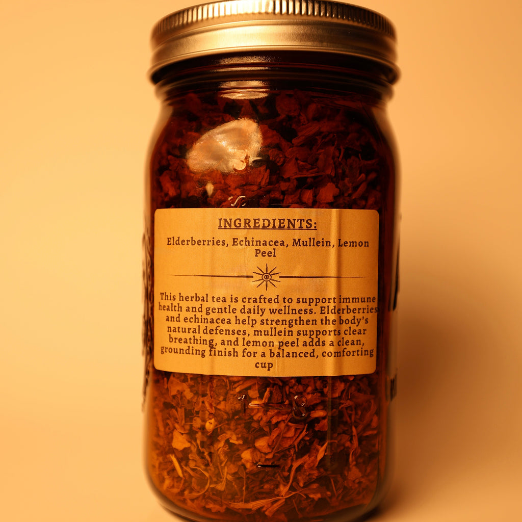 Ingredients Sambucus (Elderberries), Echinacea Purperea (Echinacea), Vetbascum (Mullein), Citrus Limon Peel (Lemon Peel)abel on the back of the jar. A tea sold by madMuchLove Holistic Healing. 